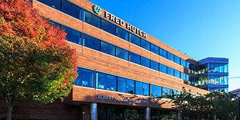 Exterior photo of Fred Hutch Cancer Center building