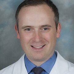 Headshot portrait of Dr. Stephen Kennedy, orthopedics and sports medicine.